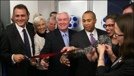 Governor Deval Patrick and Dr. Susan Windham-Bannister, President of the Massachusetts Life Sciences Center, attend the opening of Biocell Center's North American Headquarters. Pictured left to right are Marco Reguzzoni, Chairman of Biocell Center, Senator Pat Jehlen, Medford Mayor Michael McGlynn, Governor Deval Patrick, Dr. Susan Windham-Bannister, MassBio President & CEO Bob Coughlin, and Kate Torchilin, CEO of Biocell Center.